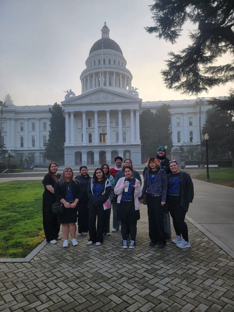 Group of people from NAMI California in front of The California State Capitol