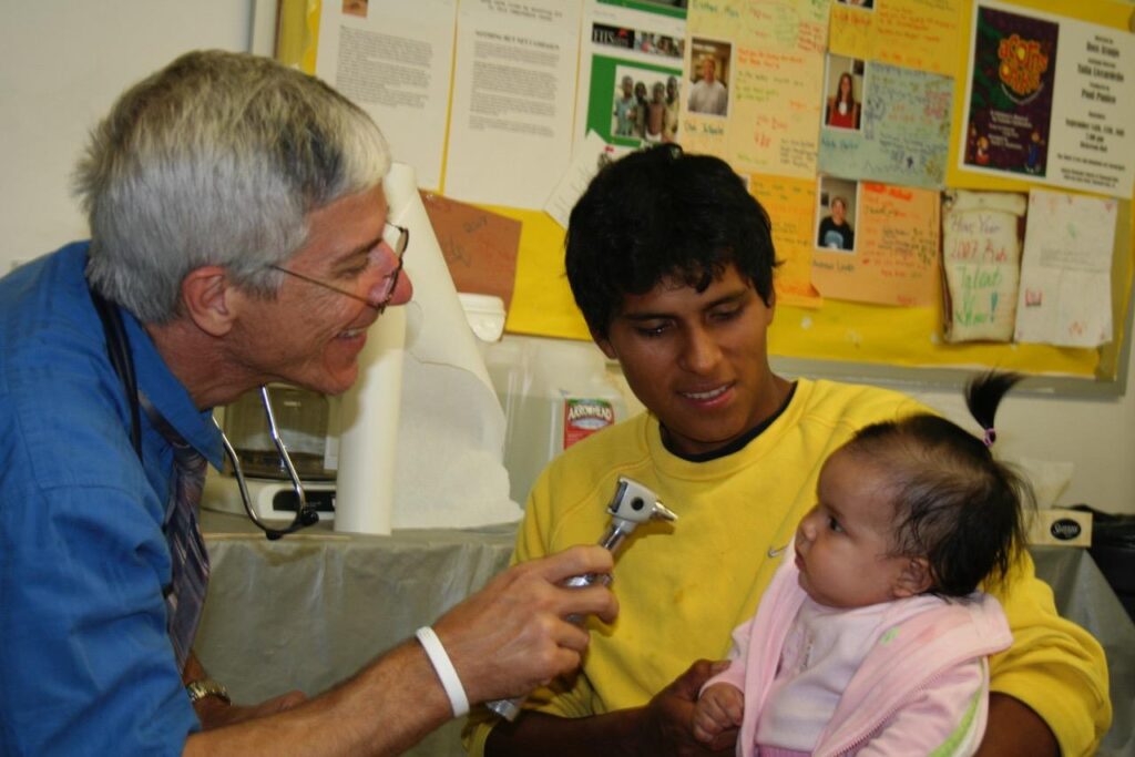 Fred Lindberg, M.D. seeing patient