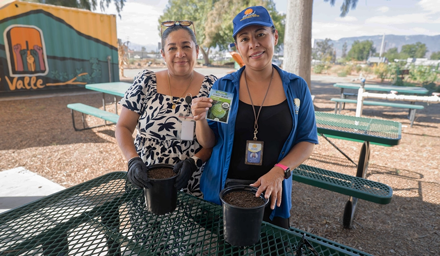 Two El Sol Neighborhood Educational Center workers