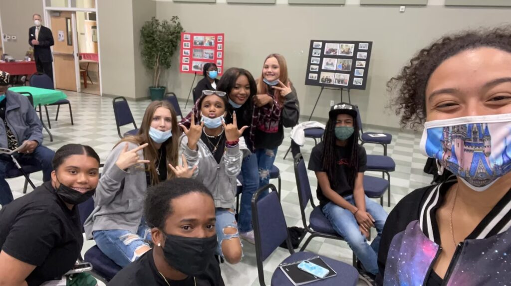 Group of middle school aged kids with masks