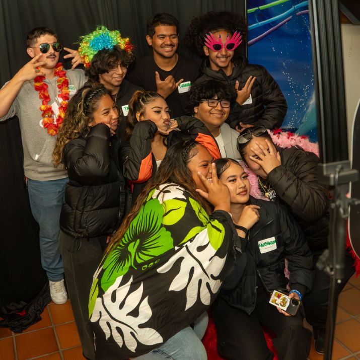 A group of 10 students posing for a group picture