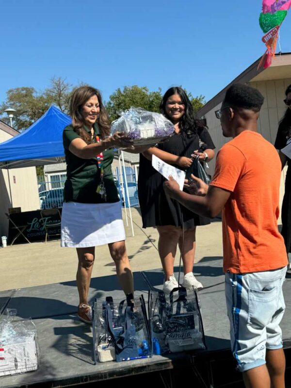Distribution of Wellness Baskets to Community Members at the CWH Launch Event at La Familia