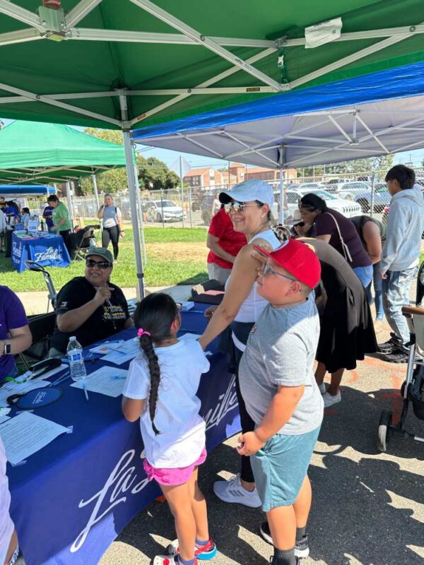 Our Community Wellness Hubs partner providing back to school information and signing up children for vaccinations