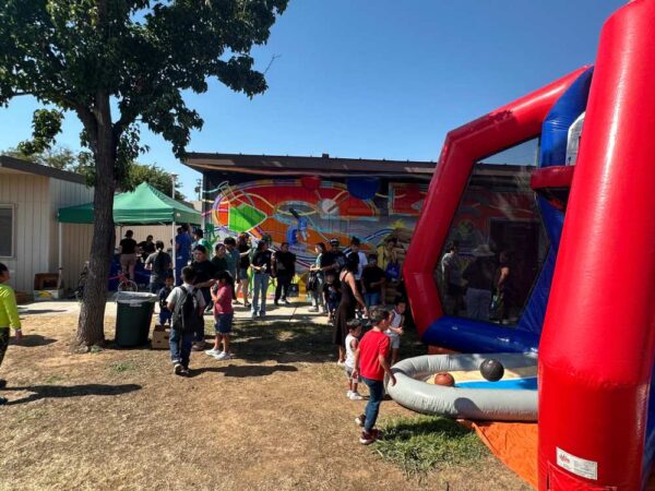 Summer 2024 Miercado Night, engaging kids to play and providing healthy juices for nutrition